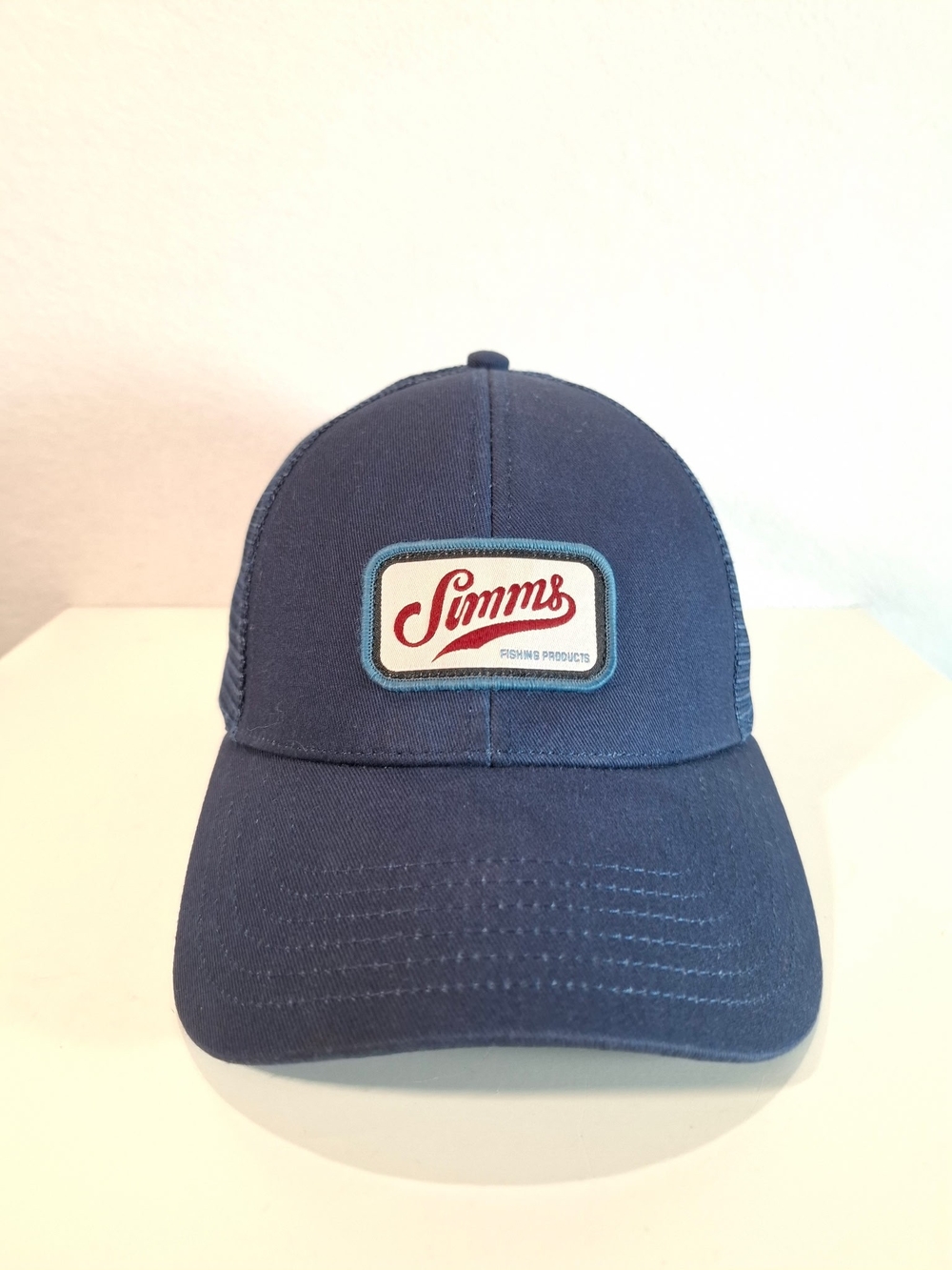 Simms Navy Trucker Hat with Red Logo Patch